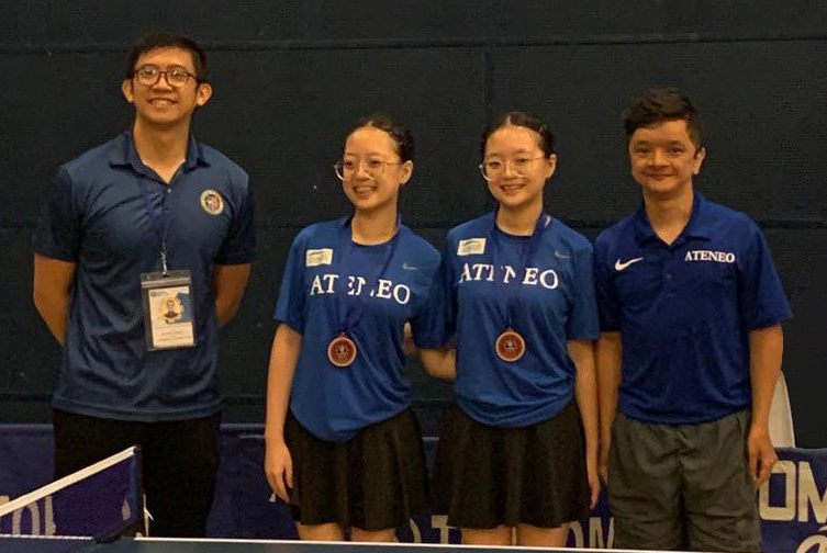 From left: Xavier official, Maxine Lo, Frances Lo, coach Mihali Crisostomo