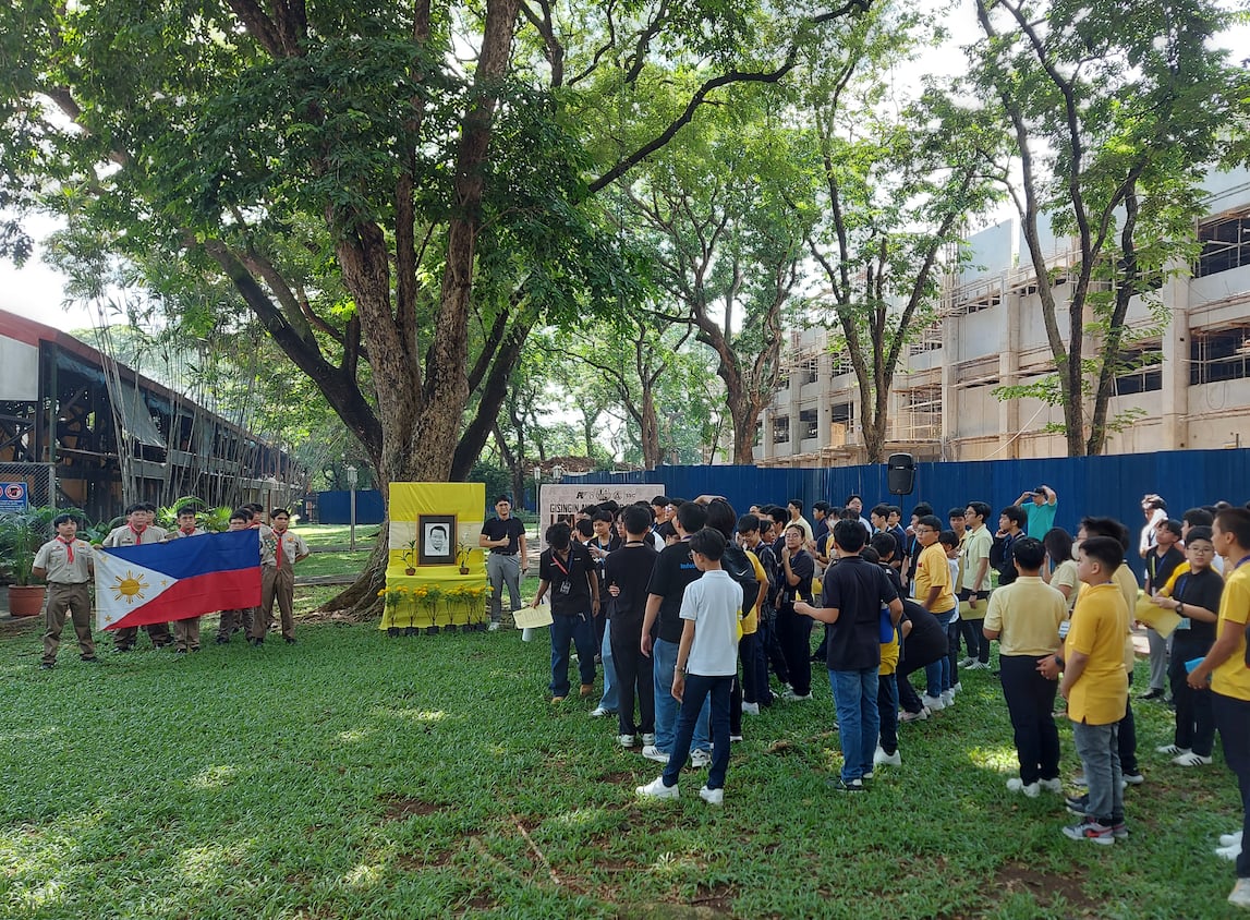The community gathers at Delaney Plaza, where a prayer for peace and national reconciliation closes the program.