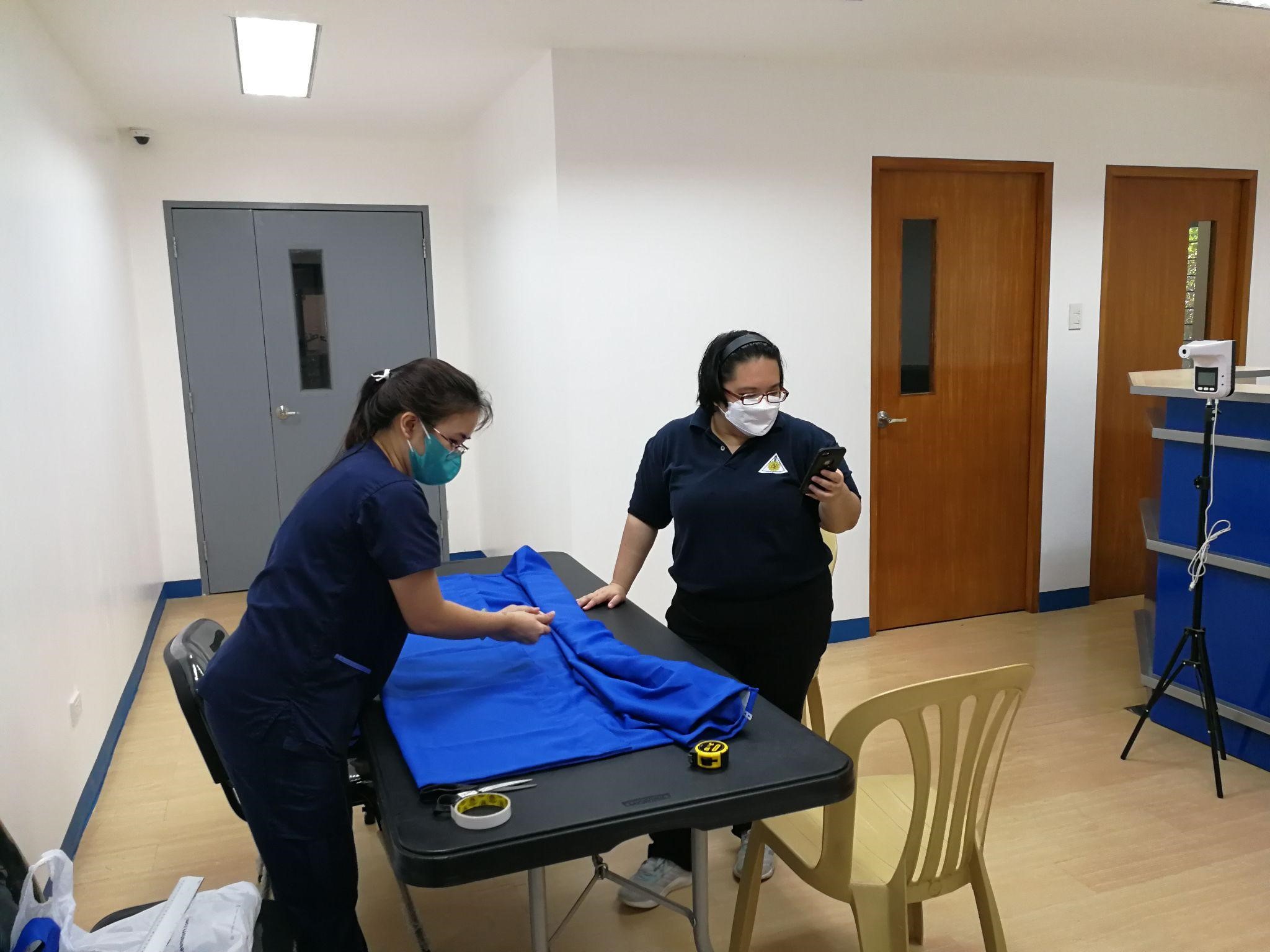 University Clinic Staff setting up the clinic.