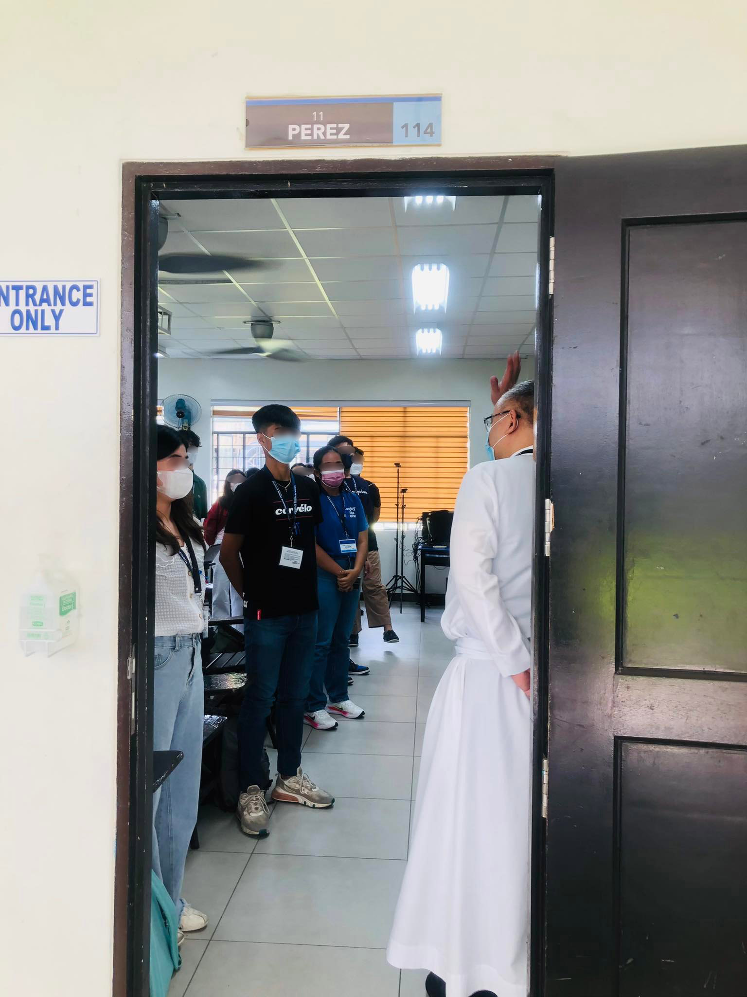 Vice President for Basic Education Fr. Jonjee Sumpaico SJ visits a grade 11 class