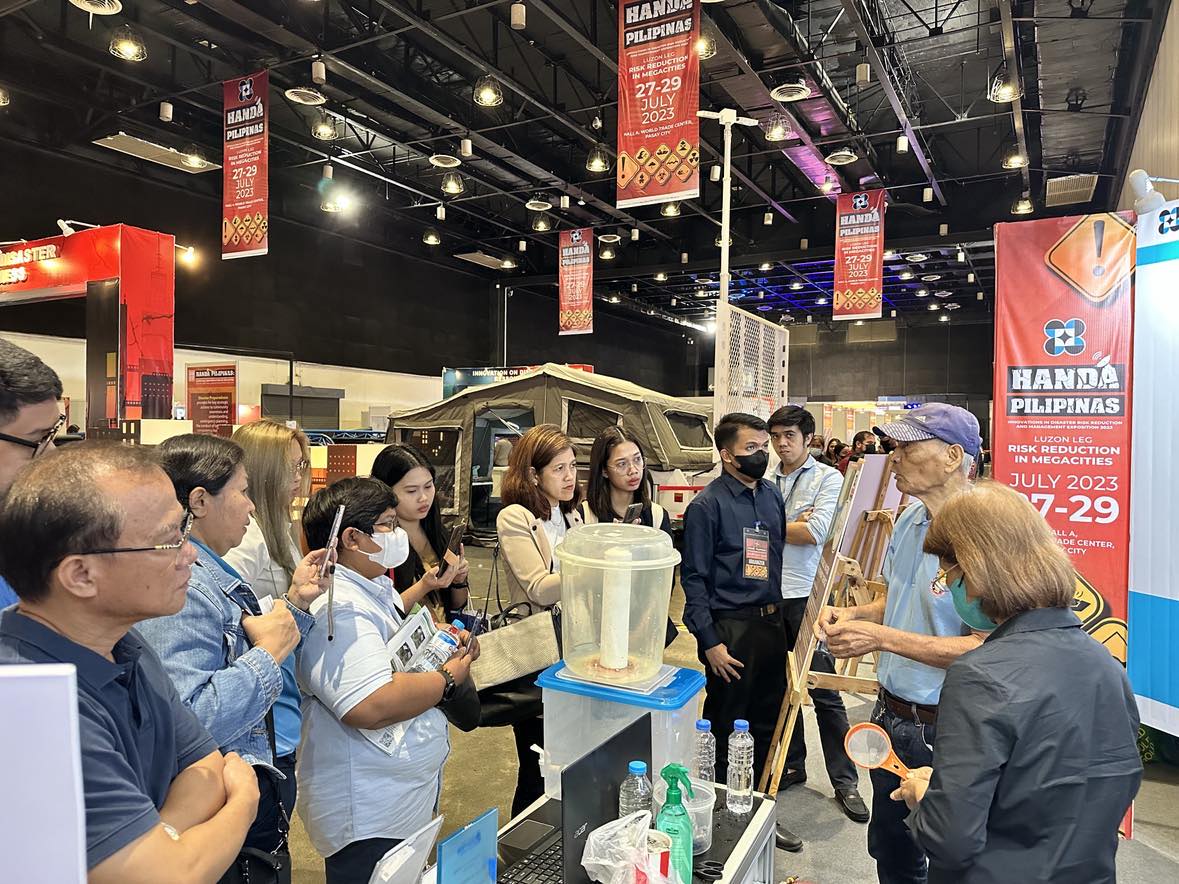 Photo: Engr. Labuntog of EAL Technologies, Inc., an Ateneo Blue Nest Incubator, demonstrating his invention, the Portable Water Treatment Device