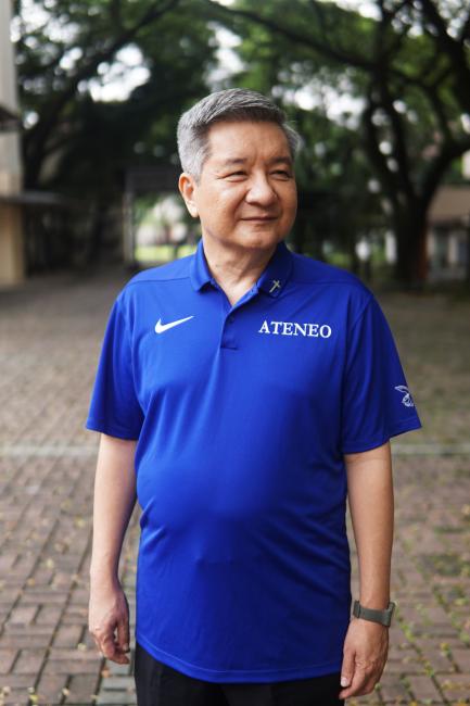 Fr bobby Yap SJ at college lane red brick road