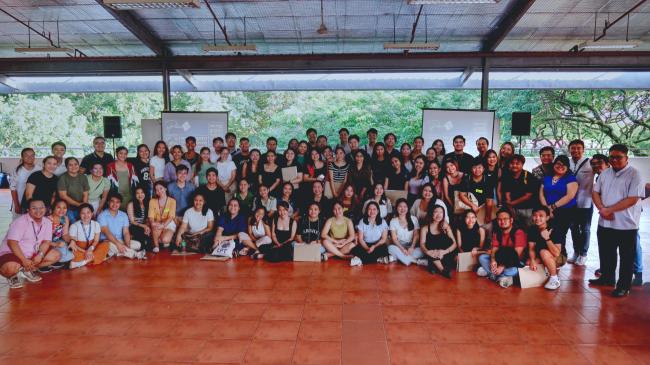 Pathway community huddles for a community photo