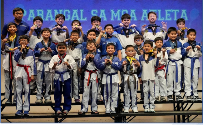 The AGS tkd jins of SY 2023-2024 pose with their medals  