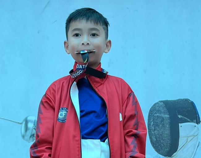 Roman Almiranez won a silver medal for fencing at the 2025 MiniMe 2nd Leg competition 